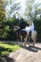 Tyler and Kim, June 2008.  Tyler is riding Blue Eyed Storm and Kim is riding Keotas Fast Cash.