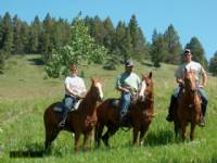 Trail riding in the Porcupine foothills. Horses from left to right are Gone To Arizona, Little Jewel Cat, and Skipper Gillette.
