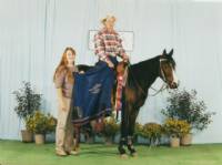 Claytons Bunny winning the APHC 2002 Signature Series Reining Futurity.  Sire: OCP Easter Bunny   Dam: Claytons Horizon.     Rider/trainer Kim Smith.   Picture taken by Arto