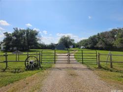 Horse-Ready Quarter with Two Homes & Heated Shop