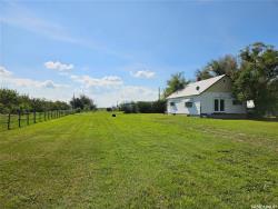 Horse-Ready Quarter with Two Homes & Heated Shop